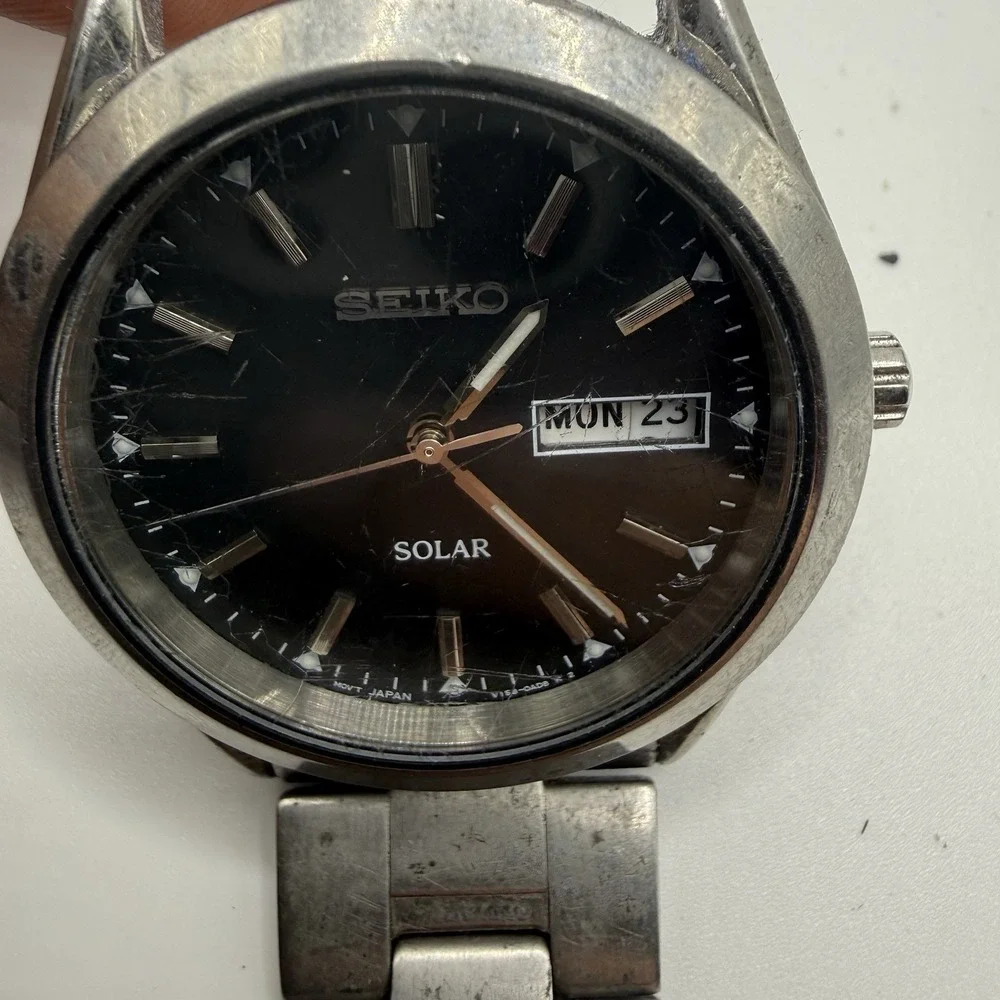 Seiko Men V158-0AB0 Dress Black Dial‎ Day Date Stainless Solar 37mm Watch